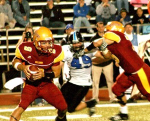 <span class='credit'>Photo By: Kate Dupon | Photographer</span><span class='description'>#9 Tom Schneider makes his way toward the end zone in Saturday’s game against Grand Valley. Ferris’ losing streak continued, with a 17-10 loss.</span>