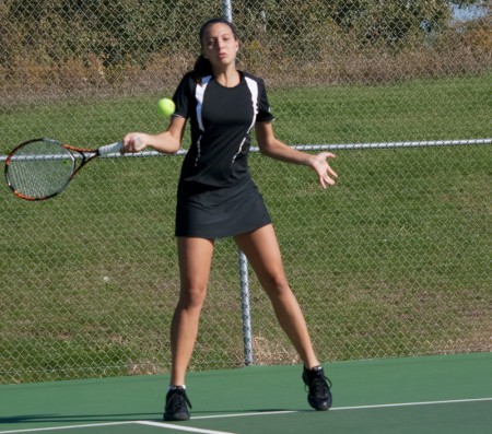 Championship Victory: Junior Natalie Diorio returns a serve during a recent tennis match. Diorio and the Bulldogs took third pace in the GLIAC Championships this past weekend, which brings their record to 11 - 3 for the fall season. Photo by Kate Dupon I Photo Editor