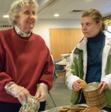 Walking for Cookies: Marga Weiss and Celeste Wallace, above from left to right, help to prepare cookies for the St. Andrew’s Episcopal Church Cookie Walk, which was held Dec. 4.  Photo By: Angie Walukonis | Photographer