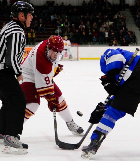 Defeating Alabama: Ferris sophomore Travis Ouellette takes a faceoff against an Alabama-Huntsville opponent. Ouellette scored twice for the Bulldogs on Feb. 11.  Photo By: Brock Copus | Photographer