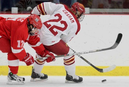 Skating By: Derek Graham, FSU junior defenseman, manuevers past a Miami player during a 2010-11 game. Torch File Photo