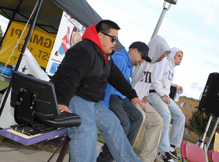 Teetoring for a Cause: Xue Lao and fellow Sigma Pi members participated in the Teetor Totter-a-Thon to raise money for the American Cancer Society. Photo By: Brock Copus | Multimedia Editor