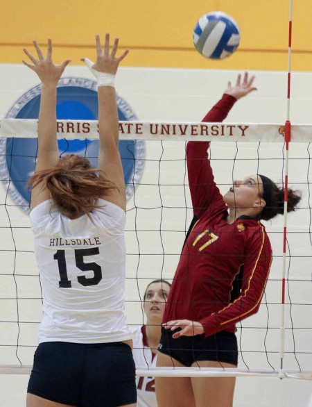Women’s Volleyball : FSU junior outside hitter Aly Brecht looks to spike against Hillsdale during a 2011 match. The Bulldogs competed in the GLIAC Crossover Tournment on Oct. 14-15 where they went 2-1. Torch File Photo