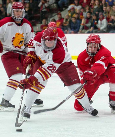 Swept Bowling Green: FSU junior left wing Kyle Bonis handles the puck away from a Miami (Ohio) defensemen. The Bulldogs swept Bowling Green series bringing the 2011-12 record to 8-2. Torch File Photo