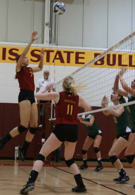 On to Regionals: FSU junior middle hitter Anne Sutton and junior setter Samantha Fordyce work together during the quarterfinal matchup against Wayne State University. The Bulldogs will play Saginaw Valley on Nov. 18 in the Midwest Regional Quarterfinals. Photo By: Kate Dupon | Photo Editor