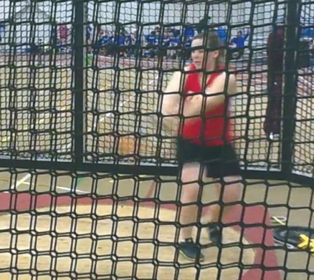 Tossing Her Way to the Top: Ferris junior Jessica Pilling throws the weight during The Cardinal Open at Saginaw Valley State. Photo Courtesy of JJ Vandenberg
