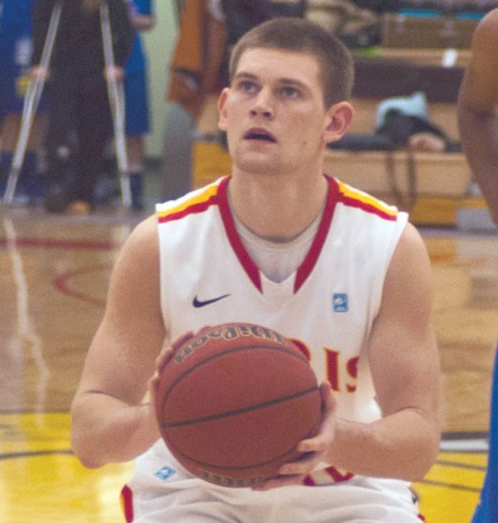 Intense Concentration: Ferris guard Drew Lehman prepares to put up a free throw against Lake Superior State. Lehman has started all 23 games this season while putting up 12.7 points per game. Photo By: Tori Thomas | Photographer