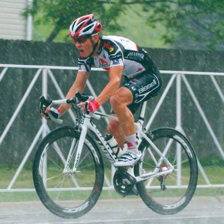 Driving Rain: Senior Alex Vanias continues to pedal through the rain. Vanias competed with the Bissell Vacuum’s under-25 professional team for a season. Photo Courtesy of Elizabeth Rangel