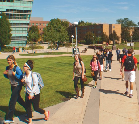More Bulldogs: Ferris students walk through the north quad between classes earlier this week. This semester, Ferris reported record high enrollment with 10,159 students on the Big Rapids campus. Photo By: Tori Thomas | Photographer