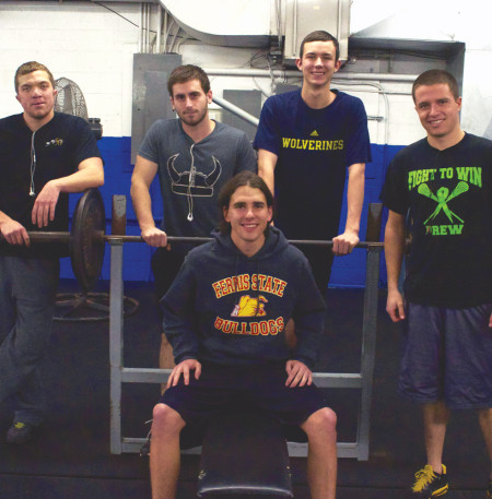 (From left) Jacob Hamlin, Brandon Aube, Tyler Hanson and Anthony Kupser surround their friend Taylor Pike (center) at TNT Gym where he had a heart attack in October. Pike, who isn’t back in the gym yet, is thankful for the support of his friends and family during his recovery.  Photo By: Melanie Ronquillo | Photographer