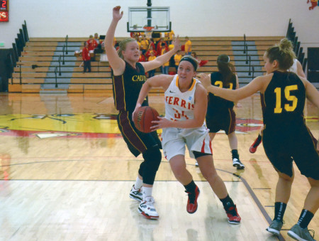 Ashley Rando breaks through Calvin defense during the 2012-13 basketball season. This year the girls are facing a gap in the season and won’t play until Nov. 23 when they face Nova Southeastern in the United Electric Tip-off Classic. Torch File Photo
