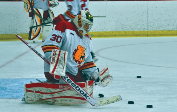 Motte makes a save during a warm up session in January, 2014