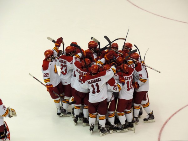 Ferris players storm the ice following their 1-0 win over Colgate in the NCAA Men's Div. I Midwest Regional