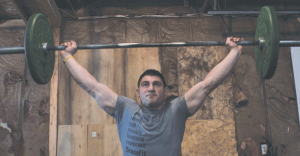 JP Kulhman demonstrates his Crossfit expertise in his home gym located in his garage.