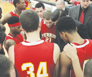 The Ferris State Men’s Basketball team takes a timeout during a game, earlier this season.