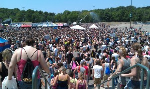 Thousands of people enter the parking lot of the Palace of Auburn Hills at the Vans Warped Tour in 2012.