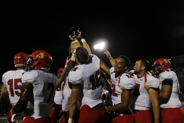 The Bulldogs hoist the Anchor-Bone Trophy for the fourth consecutive year.