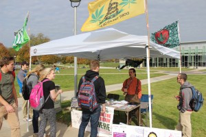 Ferris chemistry junior Michael Williams collects signitures for a petition to make marijuana a 2016 ballot proposal in Michigan.