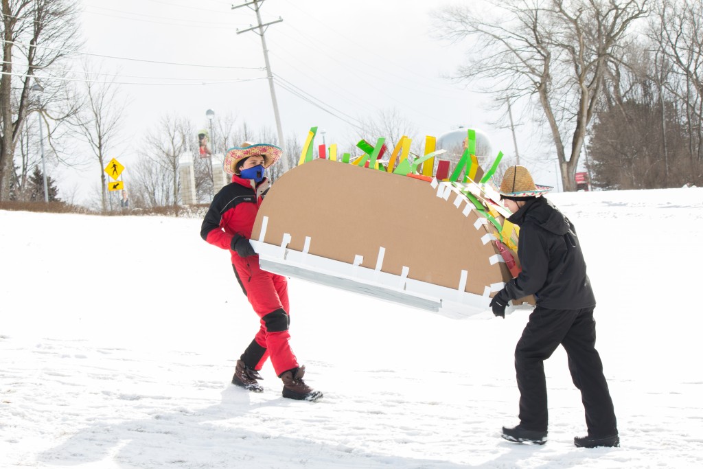Big Rapids High School students, freshman John Yost and junior Luke Sonsel, took first prize with their “Toboco” at Circle K’s annual cardboard and duct tape toboggan race.