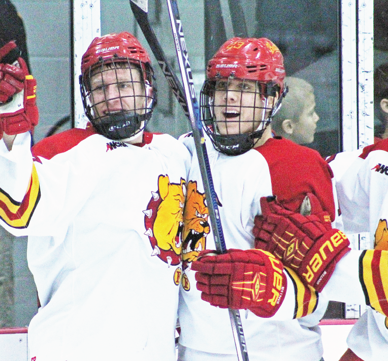Junior forward Gearld Mayhew (left) and senior defenseman Brandon Anselmini (right) and the rest of Ferris hockey will head to Ohio to take on Bowling Green this weekend.