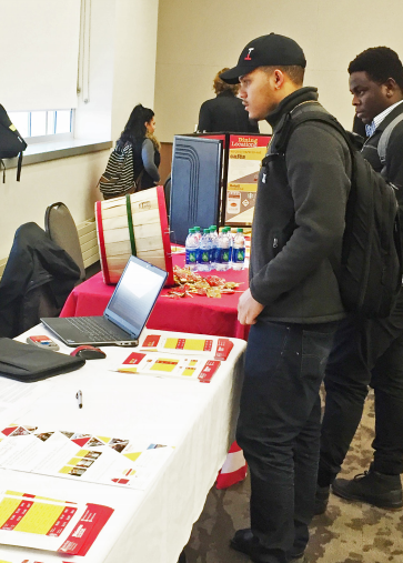 Students gathered inside the UC ballroom for the early contracting event to enter to win prizes from the Office of Housing and Residence Life.
