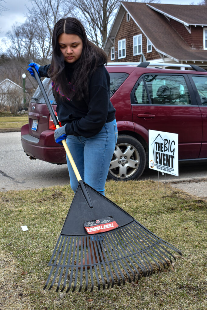 Berenise Alvarez is doing yard work at one of the over 100 homes served.